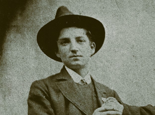 Cropped sepia tone candid photo circa 1912 of Francesco Antonio Bodoira. He is wearing a suit and a hat of the period. 